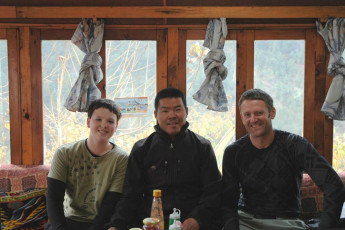 I had high hopes for an equally rewarding and successful journey. In fact, in one way more so, because Ed is physically fitter than Ben was. I’ve been visiting the Himalaya since 1988, but had never gone above 6,000 metres. It’s one of those arbitrary goals I wanted to realise. On this trip I hoped to do it. 
Back in December 2009, Ben and I met a local called Phanden Sherpa on our way between Lukla and Namche Bazaar on the first day of our two week trek. Phanden turned out to be a highly accomplished high altitude climber, who has gone on to leverage his stellar climbing CV (summits above 8,000 metres - Everest 9, Cho Oyu 5, Lhotse 1, Dhaulagiri 1) into his own trekking and climbing company, SherpaClimbing.com. Incidentally, his brother Phurenji Sherpa, lives at Mount Cook Village with his family. He played the role of Sherpa Tenzing in the recent movie about Sir Ed Hillary. So in November I gave Phanden a call to work out a little high altitude sojourn to fit within our three week self-guided trekking programme. This picture, in 2009 with Ben and Phanden Sherpa at his tea house in Ghat.