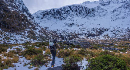 Wednesday saw improving conditions so Tom, who had just come in from Christchurch and I, agreed to team up to try for Mount Talbot, via Gertrude Saddle. We got away at dawn and made steady progress up towards the Saddle. Above the Black Lake we came upon Reg’s ski tracks of a few of days before. He had taken a day off from ‘serious climbing’ to solo Talbots Ladder and ski tour across Traverse Pass and down Gertrude Saddle, all in seven hours – hmmm. As we went, our concern grew about the snow conditions, which were like wet concrete and not improving as we ascended.