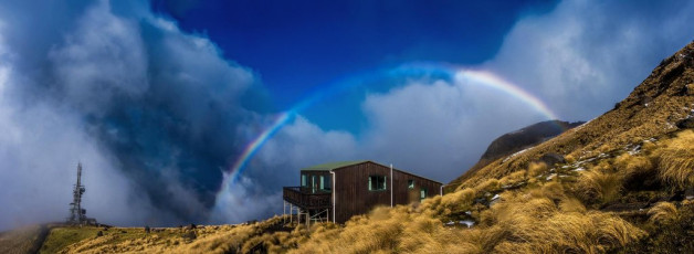 As the gradient eased again we quickened our descent, simil-climbing for a couple of hundred vertical metres, before shedding and packing the rope. We arrived back at the Lodge just as a big bright rainbow arched overhead. Our excursion had taken a little under seven hours – longer than anticipated, but still leaving just enough time to warm up, repack and drop the remaining 600 metres to the car before dark.