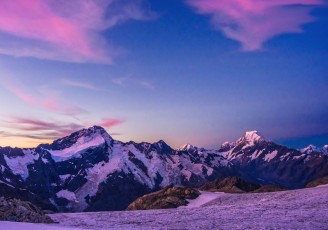 On the south western side of the Plateau we found a rocky outcrop affording both shelter and a series of little pools of clean water – an even easier water source than glacier melt. We pitched our tent, fired up the Jetboil and settled in for a beautiful sunset. The ice cliffs off Sefton and other nearby peaks took on mauve hues, belying the lethal danger that their constant ice avalanches posed.