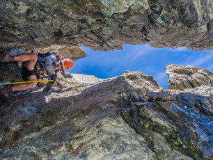 At one point we had to get the rope out to abseil into a small chasm, thereby avoiding an exposed move around a corner that was less than generous with hand holds.
Progress was slower than we’d anticipated and we found ourselves at the top of the rock teeth about 2pm. Although the route from there up onto the Plateau is meant to go left across and up a crevassed snow slope, we opted for what looked to be a straight forward headwall of snow to the right. We could see that it steepened near the top but I thought we could follow the rock on the far side to the top okay.