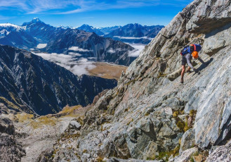 It was fairly gradual and undulating, resembling a ridge top in the Tararuas for a couple of hours, but then things got more interesting at about 1,750m. This is where the ridge becomes a serrated knife edge of rock teeth. We found our way onto the north side of the ridge, picking our way around bluffs and across little shelves.