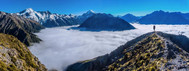 Day one dawned with what seemed to be dense cloud, which didn’t fit the weather forecast indicating fine weather for the coming three days. We set off from the road end at the base of Mount Sebastopol at 8am and made quick progress up the tourist trail to the Red Tarn. As we ascended, to our delight we soon breached the foggy cloud blanketing the entire valley and climbed into a perfect bluebird day. The sweat was soon dripping on the sustained, steep haul up to the top of Sebastopol with our heavy packs. It took a couple of hours to get to the top (1,468m), but our effort was rewarded with a crystal clear view of our intended route, as well as a 360 degree panorama of the national park.