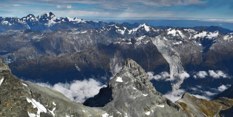 Two hours of this rewarded us with the summit. Pikirakatahi is guardian to more than pounamu. From its summit is a wonderful panorama encompassing peaks, ridges, glaciers, rivers and valleys in every direction, as far as the eye can see.