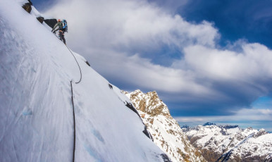 But a steep exposed ramp below Traverse Pass obliged us to get the rope back into action.