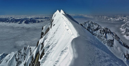 Gary had already been this way more than twenty times. While I wanted to linger for a while, savouring the moment, he only allowed a fifteen minute pause before we began our descent. Just enough time to take some hurried photos and register that the summit ridge looked intriguing, then we were off.