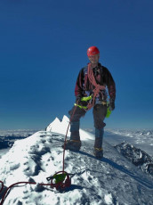 Then there wasn’t any further to climb. We topped out on the near flat summit ridge. It had taken eight hours and I felt good; a little short of breath on account of the altitude, but still with plenty of fuel in the tank for the descent. 