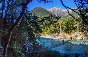 Our final day involved a flat trudge through pretty beech forest back to our water taxi pickup point near Lake Head Hut. At the other end we reunited with Nina and Ian to swap accounts of our separate experiences. Supping on a chardy back on the Ferry I mulled over my growing list of unfinished business and pondered how best to prevent that snowball called Anxiety from gathering momentum next time. This image - Crossing the Travers River about an hour south of Lakehead Hut.