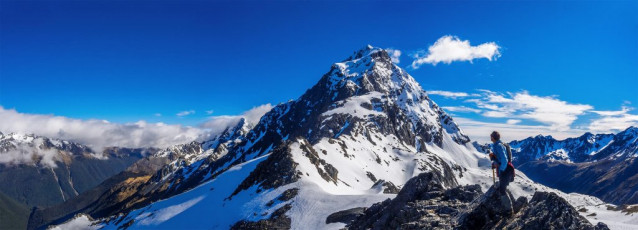The south ridge and summit of Mt Travers, viewed from above Travers Saddle. Mt Cupola is just left partly in cloud.