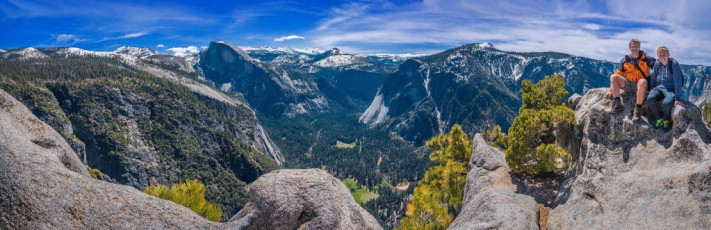 Across the foot bridge we found ourselves plugging up through spring snow. Invisible down in the valley, beyond the valley rim the terrain changes dramatically into rolling, pine clad snow fields. We soon reached our high point for the day at 2,114m back on the valley rim. Here, to calm myself after gazing over the sheer edge, I worked a bit more on supersizing myself with yet another bagel (these were the best sandwich option due to American bread being pumped full of sugar). This image - The view from Yosemite Point.