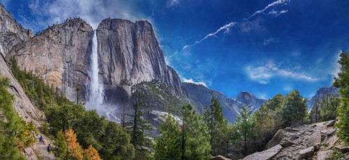 Yosemite Fall was our focus on the morning of our second day. From the valley floor a stone staircase zigzags up about 500 metres to a narrow shelf, which leads around to a mist soaked basin where the upper portion of Yosemite Fall cascades down a sheer wall. Across the valley are nice views of Half Dome, until the trail cuts up a steep chasm, seeming to almost disappear behind the Fall. Actually it pops out a little up river from the jaws of death, leading to a footbridge across Yosemite Creek which, for us, was more a raging torrent. This image - Upper Yosemite Fall and Yosemite Point (2,114m)