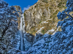 Graeme was aiming to reach 1,500m – about 200m higher than we had reached, so he could dig some pits to update his snow condition report. He assured us that conditions were bad, which made us feel a bit better about retreating in such fabulous weather.
This image - Punch Bowl waterfall – a nice diversion when waiting for conditions to improve