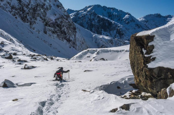 After an early lunch we plunged back into the powder and began a snow plough, this time back along the stream bed, hoping it might be more interesting than retracing the higher route we had taken on the way in, so as to avoid deep snow in the stream bed. Oh yeah, deep snow in the stream bed. And of course, that’s what we did encounter.
This image - When a climb becomes a swim – at our reluctant turn around point