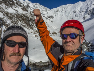 By 10am we found ourselves sitting on a boulder near the head of Otira stream, in beautiful sunshine, under a cobalt sky. We were on an island surrounded by waist deep unconsolidated powder with zero base. Hidden holes into rock and tussock cracks everywhere.
How could this be? There had been no freeze at all, despite the cold clear night. Well, the snow was so dry that it wouldn’t freeze. The melt we needed had not happened the day before and, here we were, still with a good eight hours of blue bird daylight, about to throw in the towel. Bugger and double bugger. Lesson number three - blue bird conditions are no guarantee of success on the hill.
