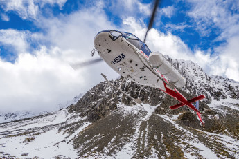 It wasn’t all suffering on a recent trip in to the upper reaches of Bush Stream in the Aoraki Mount Cook National Park though. For one, we choppered in to our campsite rather than slog 5kms up the rocky bed of Bush Stream from the road end near Glen Tanner. That meant we had luxuries like precooked dinners and red wine. When shared across our party of five, a trip in and out was only $220 per head – money well spent I say. This image - Our chopper departs, Mt Brown behind.