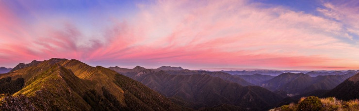 As darkness fell we settled into our tents and bivvy bags to enjoy a moody sunset. Dawn was even better. Parts of our intended route to the west emerged in mauve and pink hues, as the sun approached the horizon on our eastern side. This image - A dawn view from our 1,463m campsite on the Arthur Range, looking west and north to the Luna Ridge.