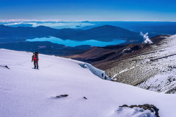 Then we climbed again, eastward to the top of Rotopaunga (1,856m) and gazed out over Lakes Rotoaira and Taupo to the north. In the foreground lay Te Mari (1,739m), the site of Tongariro’s most recent eruption on 6th August 2012, which sent an ash cloud five miles into the sky. For us, while some white geothermal steam lazily twisted its way skyward, there were virtually no clouds to be seen. This image - At the east side of the North Crater Plateau, looking towards Ketetahi and Lake Taupo.