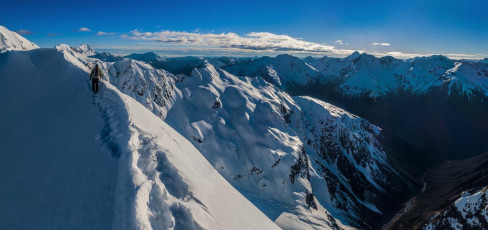 In such nice conditions Rome Ridge looked comfortably free-climbable as we steadily ascended. On the steep, knife-edged sections though, I reflected on how much scarier and slower progress would be when iced up or in strong winds. 
This image - At about 1,800m on Rome Ridge, on the narrow section before the notch.