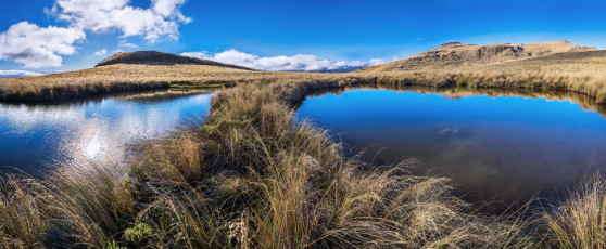 Up there the landscape mellows, with a softly curving eastern skyline and many thirst quenching tarns – the perfect place to camp, which we did. This image - Tarns at 1,280m on the northwest side of Mt Somers. Our campsite is left and the summit area of Mt Somers right