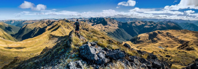 But before we headed down there to set up, we dropped our packs and scrambled up the Apprentice. The top commanded superb 360 degree views. Shaun rattled off many facts about the peaks, ridges and valleys surrounding us. The landscape stretched further out in every direction than I’d imagined. Regrettably though, clouds were gathering in the south west and the wind was building. This image - A view south and west from the summit of the Apprentice. Lucretia is directly ahead and the Grand Duchess (1,703m) slightly to the right. Our camp tarn is far left