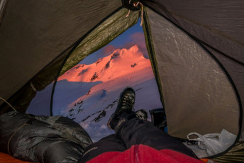 That night was cold so, because my boots got wet during our ascent through the wet snow, I brought them inside the tent in the vain hope that they might dry slightly.