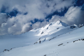 By now the weather had started to clear and we enjoyed our first glimpses of our objective of tomorrow, as we levelled a tent platform and established camp. From our spectacular vantage point above Brewster Glacier, to me, the south west face looked dauntingly steep. “No worries Pete. It should be fun.” Piotr reassured me.