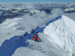 “We better not hang about. The viz is getting worse and the snow is only going to soften more” I said. We’d contemplated earlier the possibility of a ridge descent to the west, but now the best option was to use our own tracks up the 50 degree south west face as a handrail down. This image - A view from nearly 2,500m, north west along the main ridge of Mt Brewster. This is the only shot this way either of us took before whiteout conditions made it impossible (Photo Piotr Nowak)