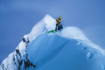 A few minutes of delicate traversing, as I played out the rope, saw Piotr on top. He used our other snow stake to anchor himself similarly to me, so I could follow him up and, soon, I joined him. I’d hoped the clouds might blow over, but that wasn’t happening – a pity because the summit panoramas I usually photograph weren’t on offer. “Ah well,” I thought “at least we’re on top.” Four years ago, I’d made a guided attempt via the long west ridge. Since then Brewster had been unfinished business. Now it wasn’t.  This image - my view from the summit back to Piotr
